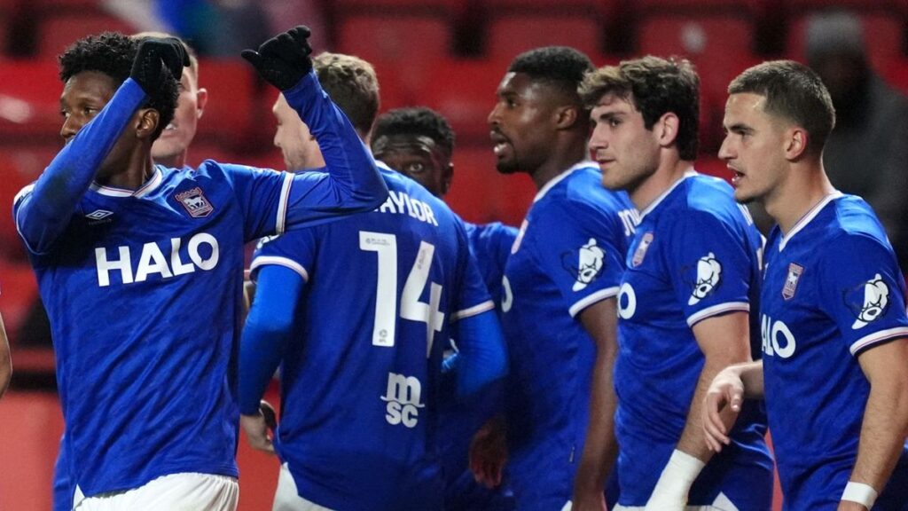 Ipswich Town players celebrating their comeback victory against Charlton Athletic