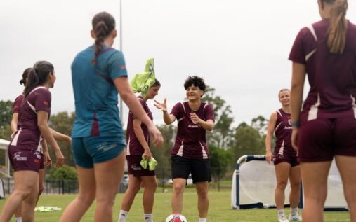 Iranian women's footballers Fatemeh Pasandideh and Atefeh Ramezanisadeh on the pitch
