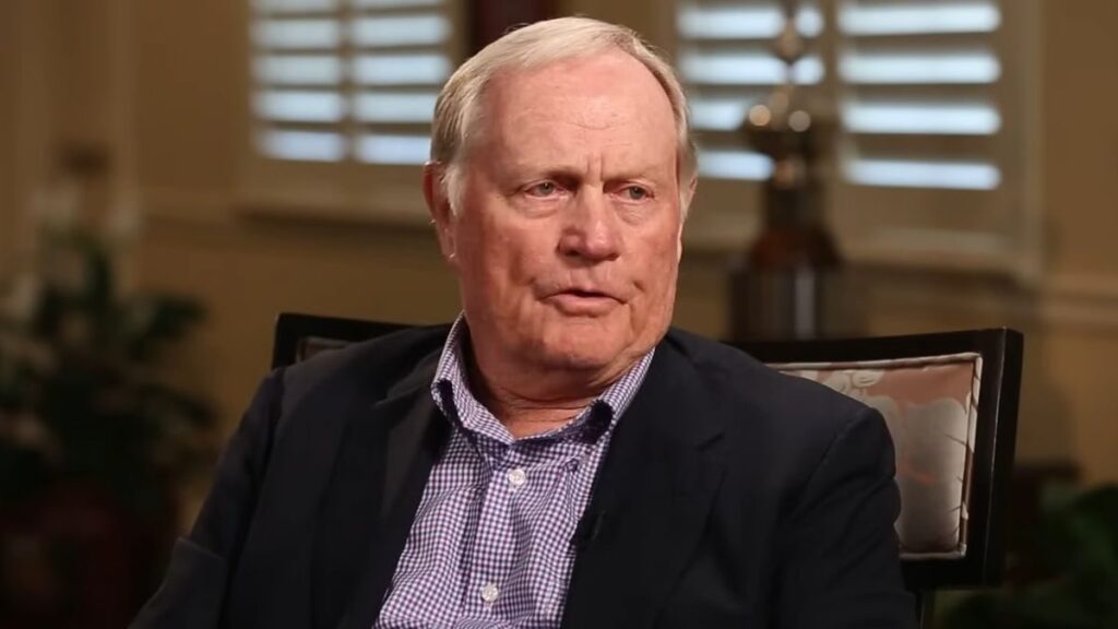 Tiger Woods and Jack Nicklaus walking together on a golf course