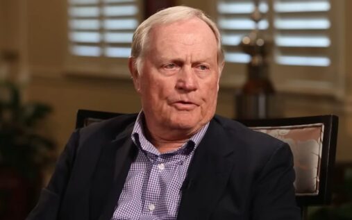 Tiger Woods and Jack Nicklaus walking together on a golf course