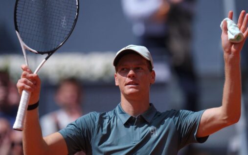 Jannik Sinner hitting a forehand on the clay courts at the Madrid Open
