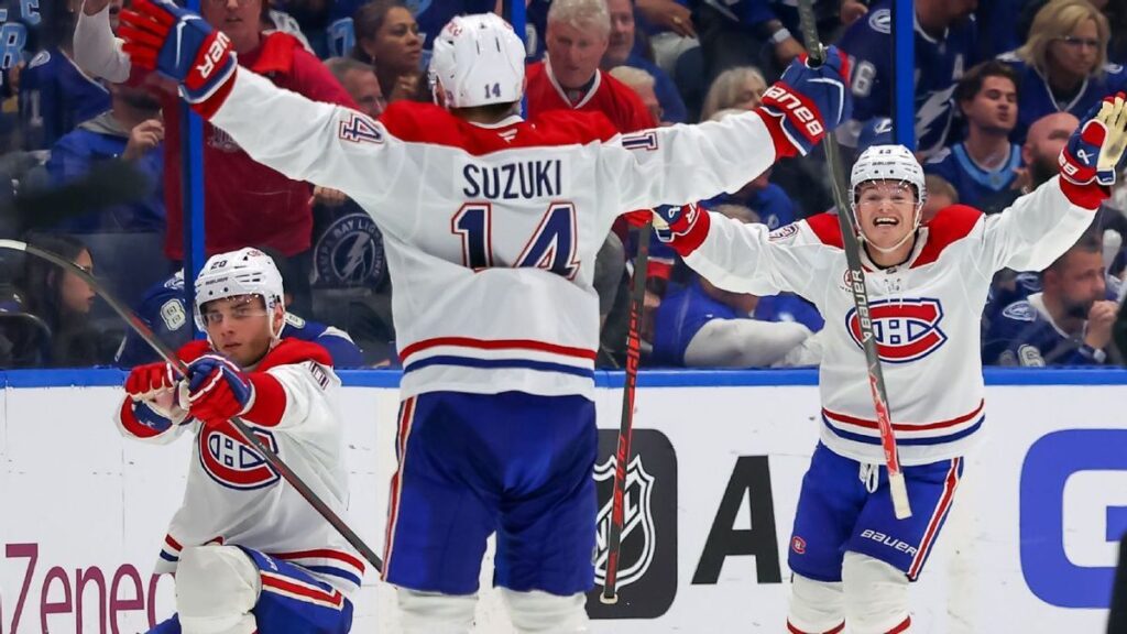 Juraj Slafkovsky of the Montreal Canadiens celebrating his overtime winning goal on the ice
