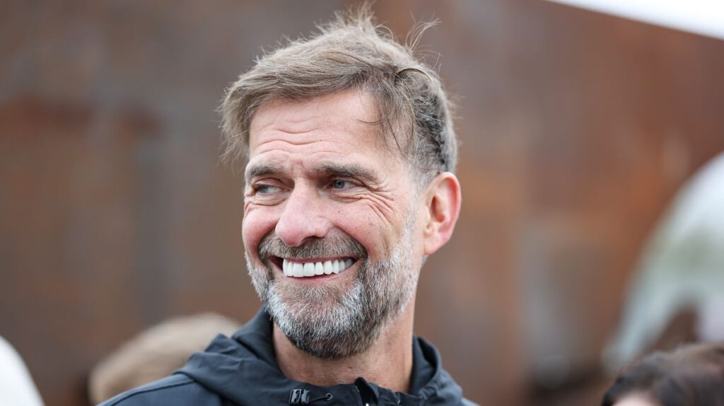 Jurgen Klopp smiling while attending a Red Bull football event in New York