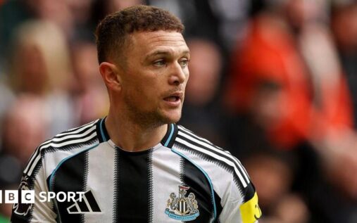 Kieran Trippier waving to Newcastle United supporters on the pitch
