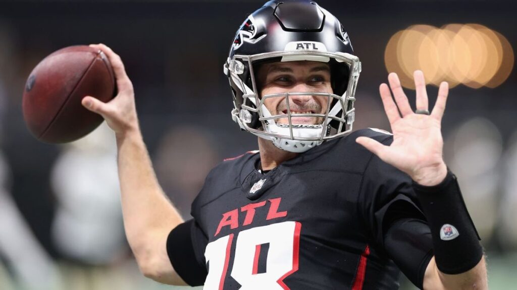 Quarterback Kirk Cousins preparing to throw the football during an NFL game