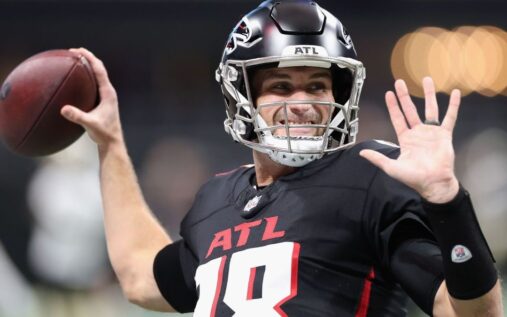 Quarterback Kirk Cousins preparing to throw the football during an NFL game
