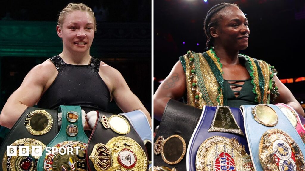 Lauren Price posing confidently with her welterweight boxing world title belts