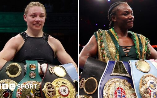 Lauren Price posing confidently with her welterweight boxing world title belts