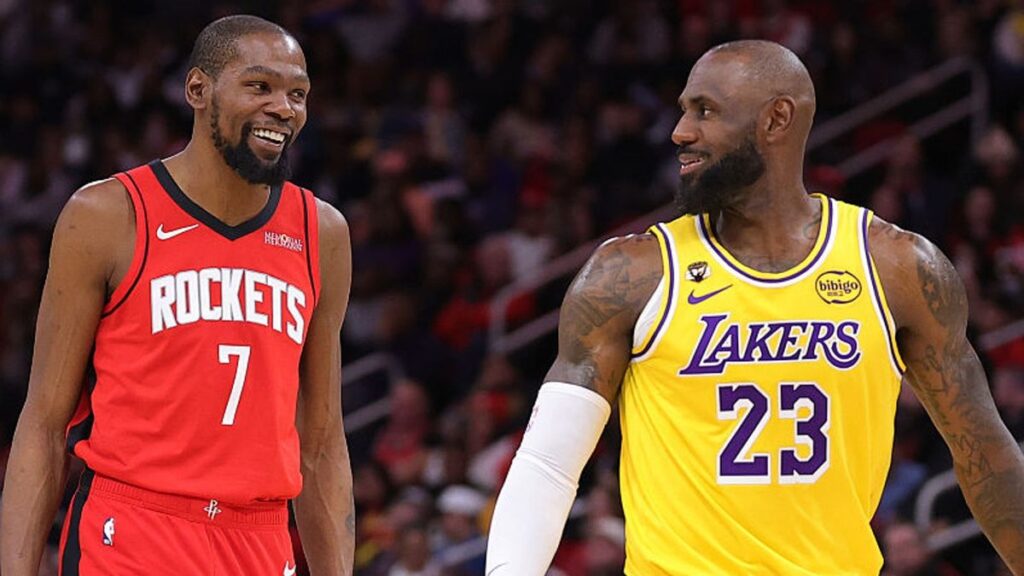 LeBron James and Kevin Durant facing off on the basketball court during an NBA game