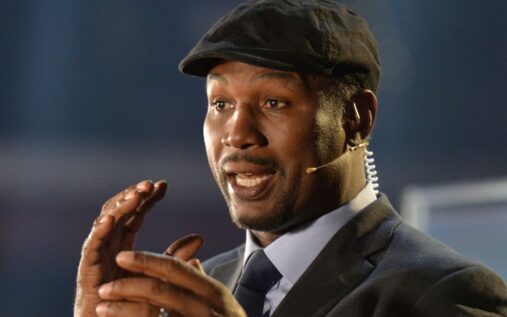 Lennox Lewis speaking to the media alongside undisputed champion Oleksandr Usyk