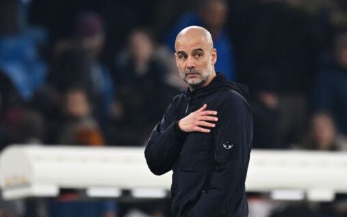 Pep Guardiola gesturing on the touchline during a Manchester City match