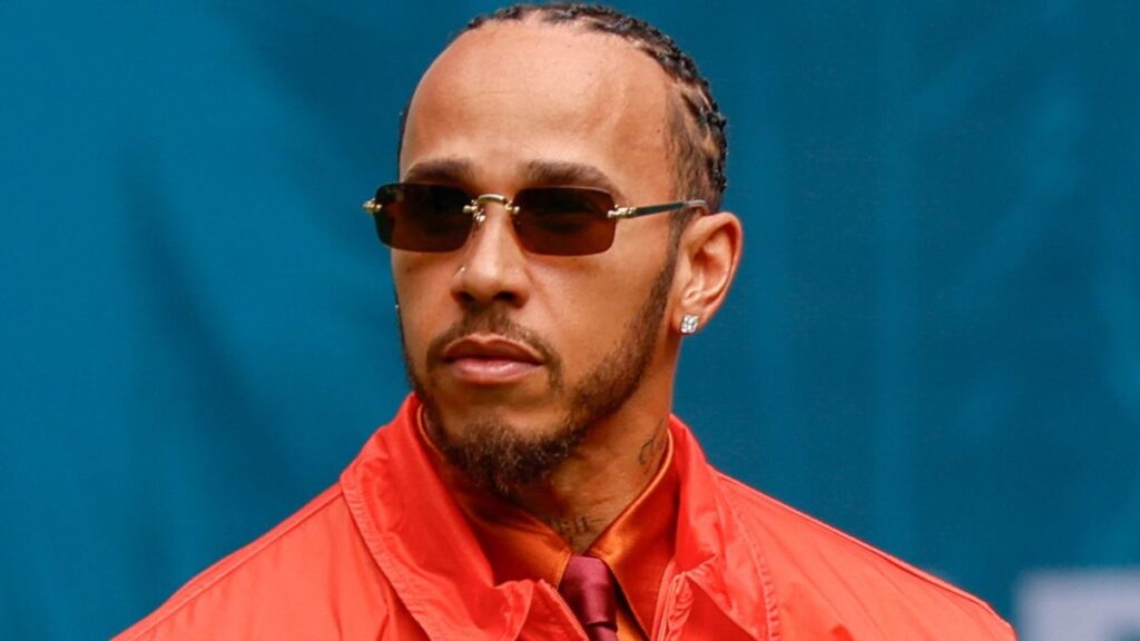 Lewis Hamilton wearing Ferrari team clothing looking focused ahead of the Formula 1 Miami Grand Prix