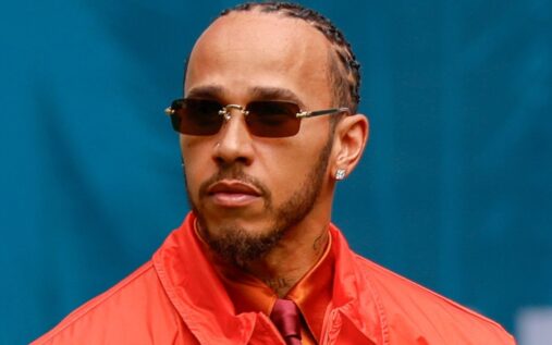 Lewis Hamilton wearing Ferrari team clothing looking focused ahead of the Formula 1 Miami Grand Prix