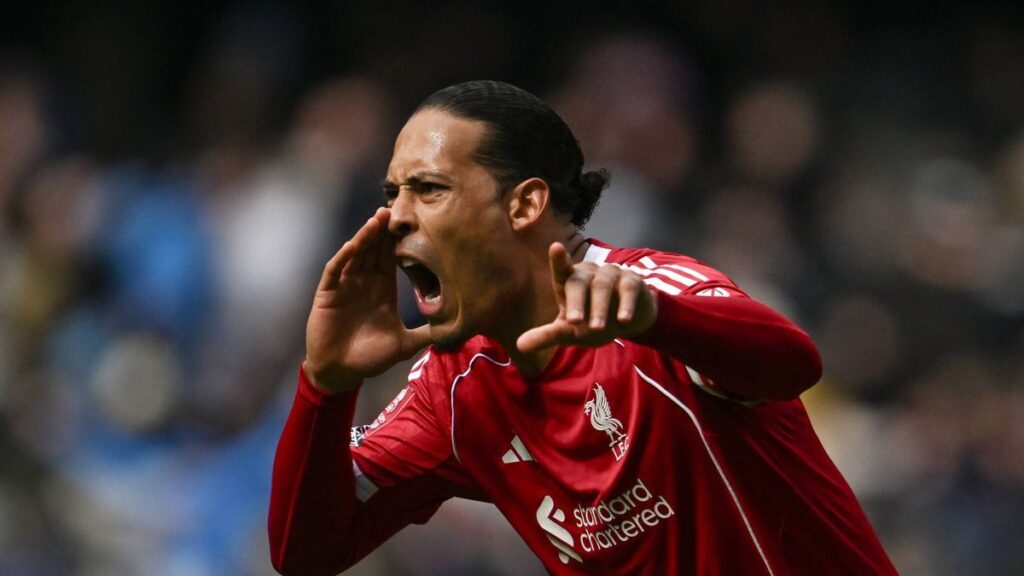 Liverpool captain Virgil van Dijk directing his teammates on the pitch