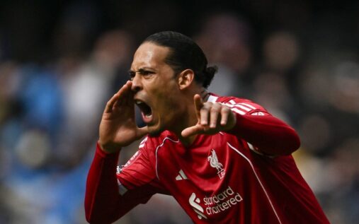 Liverpool captain Virgil van Dijk directing his teammates on the pitch