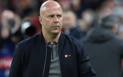 Liverpool manager Arne Slot looking thoughtful on the touchline during a Premier League match