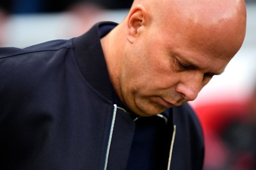 Liverpool midfielder Curtis Jones looking dejected after sustaining an injury