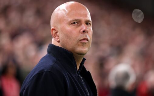 Liverpool manager Arne Slot looking thoughtful on the touchline