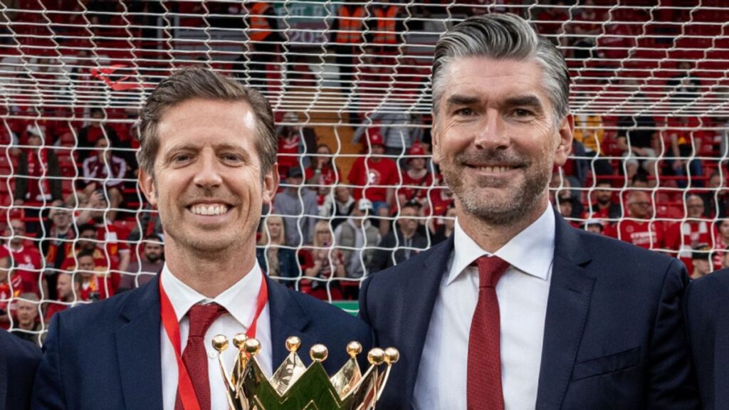 Liverpool transfer executives Michael Edwards and Richard Hughes standing at Anfield
