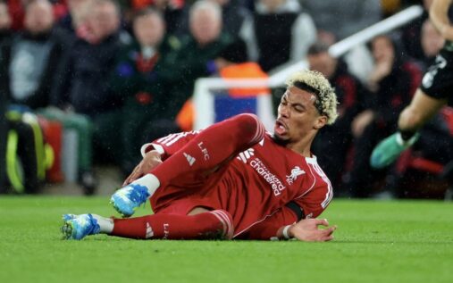 Liverpool striker Hugo Ekitike being carried off the pitch on a stretcher at Anfield