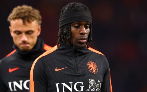 Jeremie Frimpong looking dejected in a Liverpool shirt on the pitch