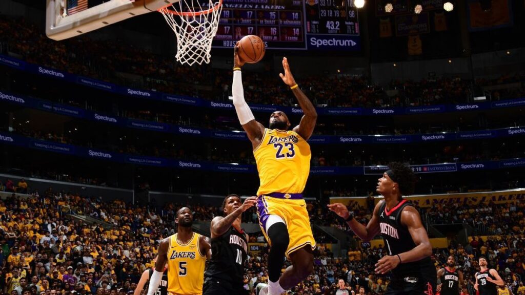 LeBron James driving the ball during the Los Angeles Lakers' playoff game against the Houston Rockets