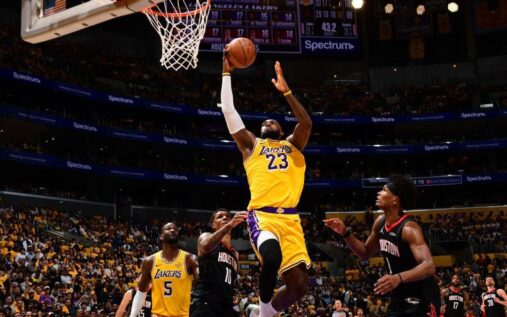 LeBron James driving the ball during the Los Angeles Lakers' playoff game against the Houston Rockets