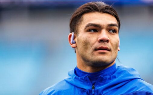 Los Angeles Rams wide receiver Puka Nacua standing on the field during an NFL match