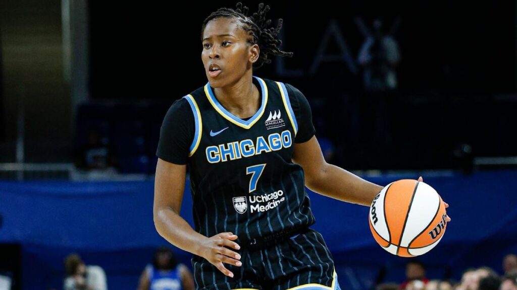 Ariel Atkins dribbling the basketball during a WNBA game