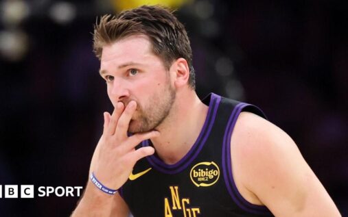 Luka Doncic of the Los Angeles Lakers celebrating on the court during an NBA basketball game