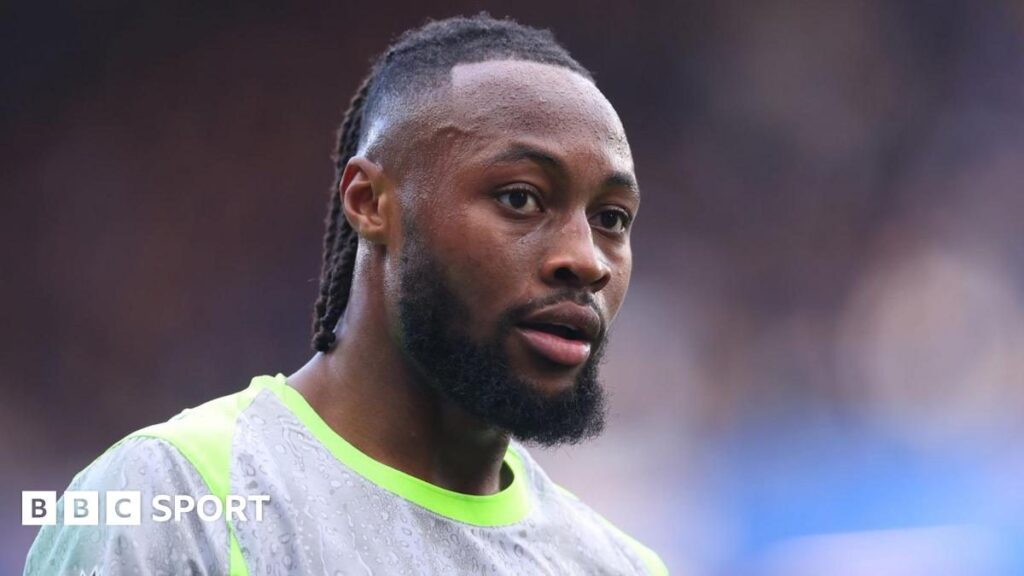 Manchester City forward Antoine Semenyo looking serious on the football pitch
