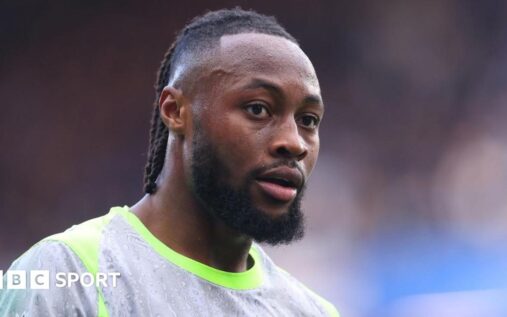 Manchester City forward Antoine Semenyo looking serious on the football pitch