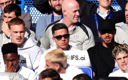 Manchester City players celebrating a goal against Chelsea at Stamford Bridge