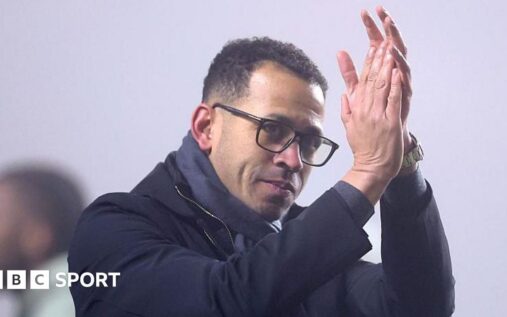 Michael Carrick standing on the touchline directing his Manchester United players