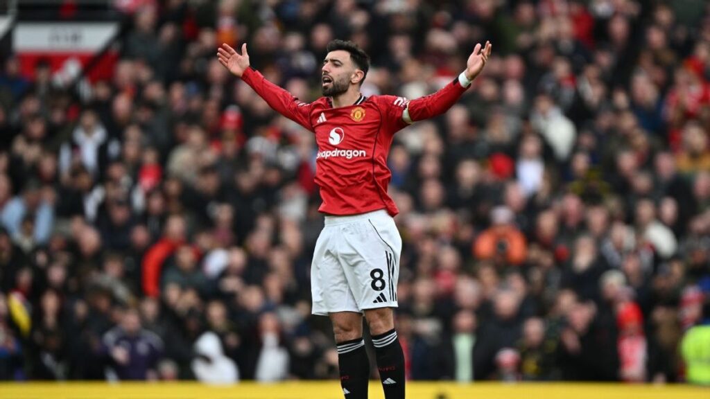 Manchester United captain Bruno Fernandes looking thoughtful on the pitch