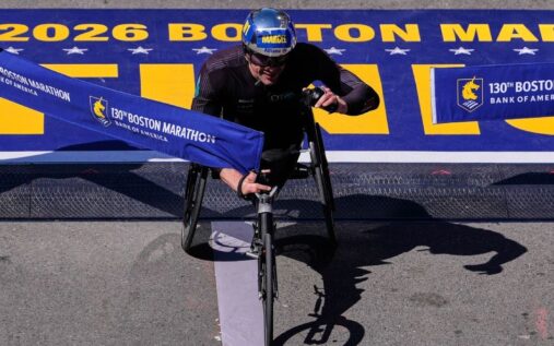 Marcel Hug competing in his racing wheelchair at the Boston Marathon