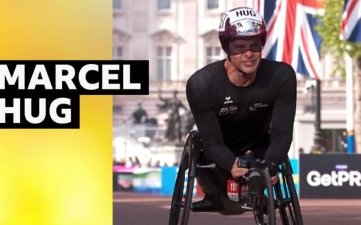 Marcel Hug crossing the finish line in his racing wheelchair at the 2026 London Marathon