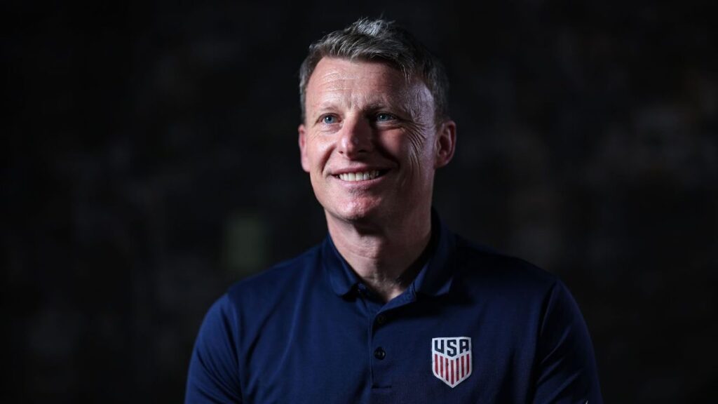 Matt Crocker standing on the touchline in US Soccer Federation apparel