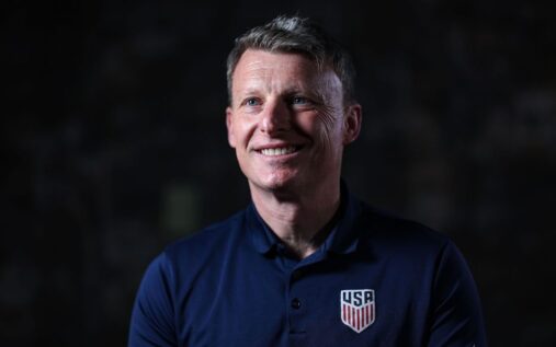Matt Crocker standing on the touchline in US Soccer Federation apparel