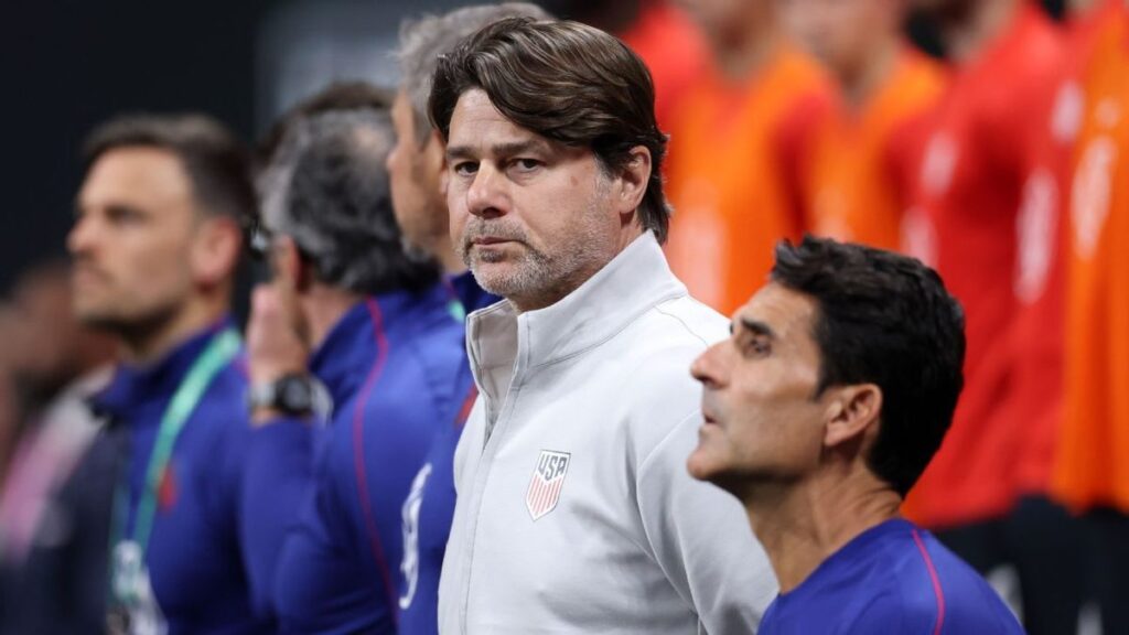 USMNT manager Mauricio Pochettino looking thoughtful on the touchline during an international match