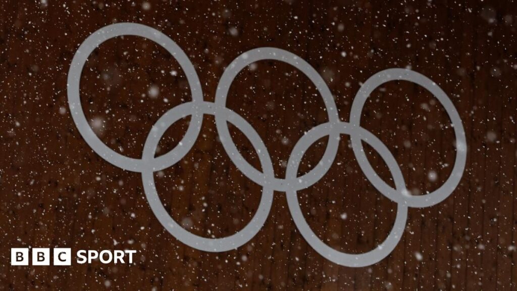 Olympic rings displayed at a snow-covered Milan-Cortina Winter Games venue