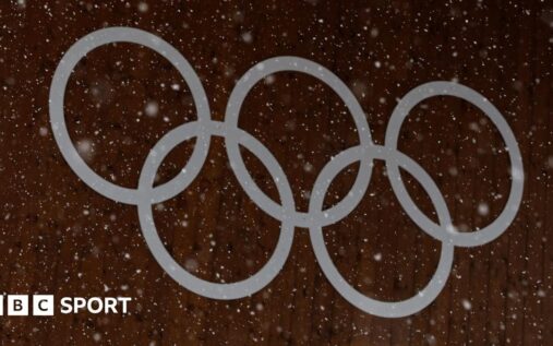 Olympic rings displayed at a snow-covered Milan-Cortina Winter Games venue