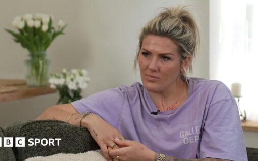 Millie Bright looking emotional while wearing the Chelsea captain's armband during a Women's Super League match.