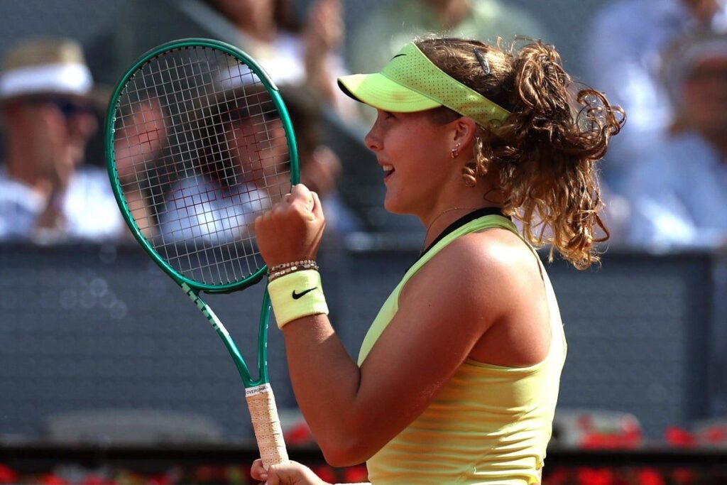 Mirra Andreeva celebrating a point on the clay courts at the Madrid Open