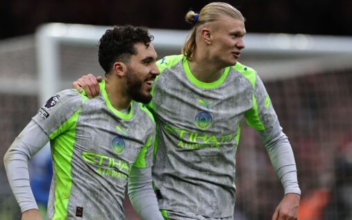 Mohamed Salah looking thoughtful on the pitch during a Liverpool Premier League match