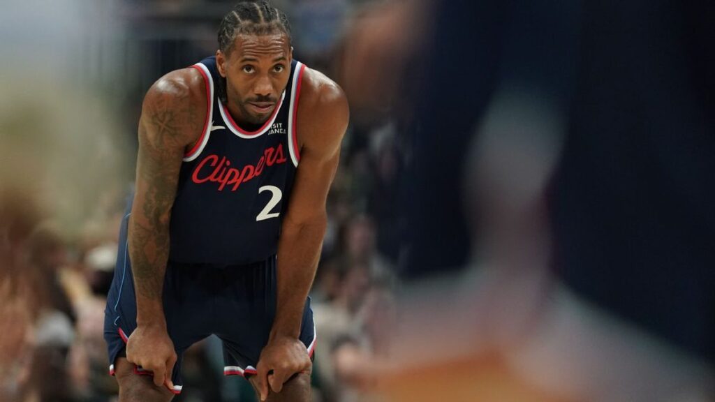 LA Clippers forward Kawhi Leonard standing on the court during an NBA basketball game