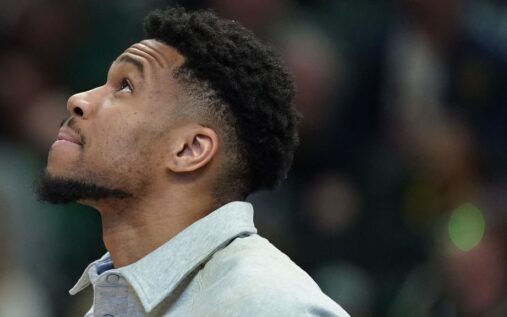 Giannis Antetokounmpo looking frustrated on the Milwaukee Bucks bench