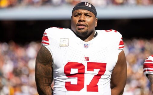 Dexter Lawrence of the New York Giants standing on the field during an NFL game
