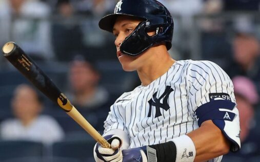Aaron Judge and Mike Trout watching a home run fly into the stands at Yankee Stadium