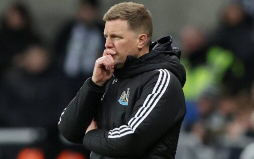 Newcastle United manager Eddie Howe standing on the touchline looking focused